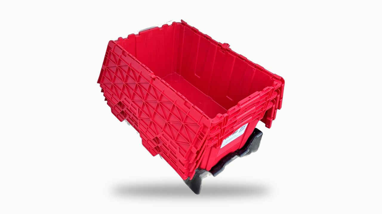 A red moving tote with its attached lid folded open, on top of a closed stack