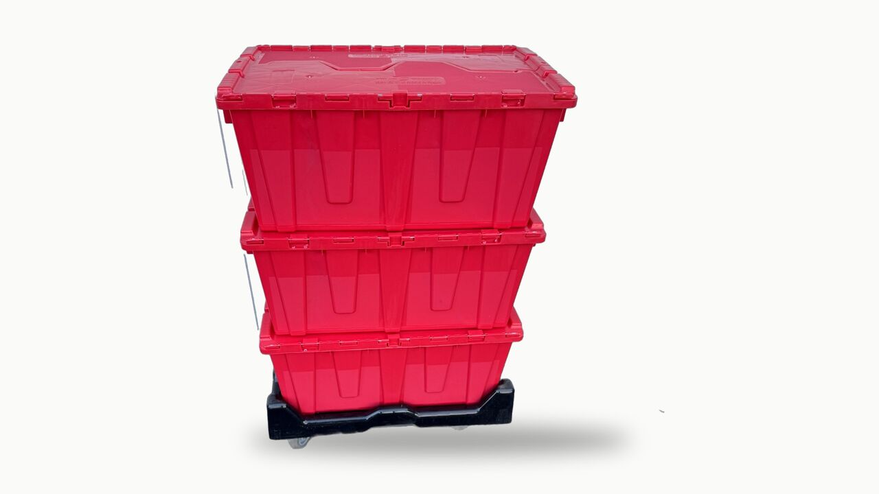Three stacked red totes seen from the lid side, showing the two-piece attached red lids